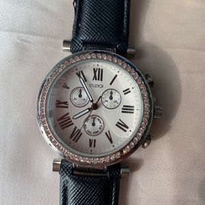 Black strapped watch w/ rhinestone detail
